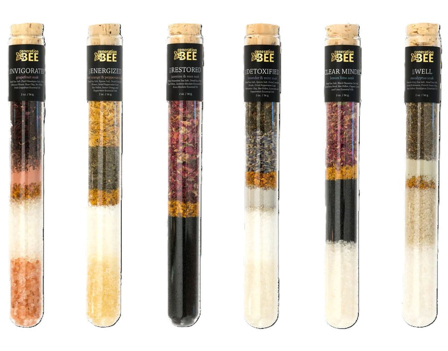 Bath tubes containing bath salts that given benefits including energy, restored, detox, clear mind, wellness. Perfect for gifts.