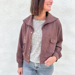 Brown suede relaxed bomber jacket with gold buttons and pockets