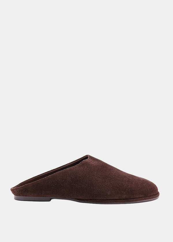 A single dark brown suede mule slipper shown in profile against a light gray background.