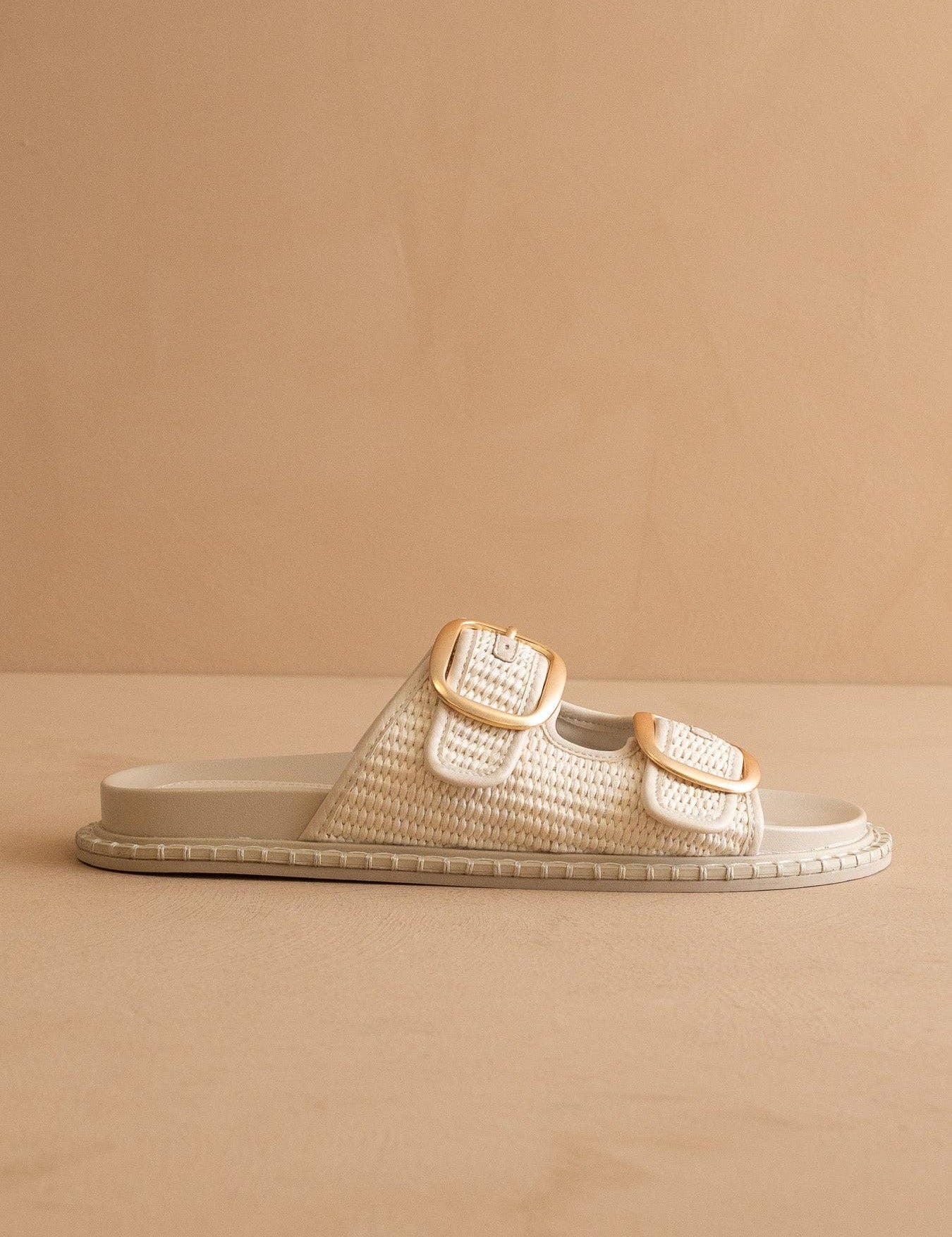 The Daytona Ivory Gold Buckle Sandal by Oasis Society